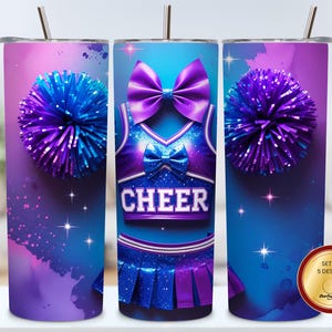May include: A set of three 20 oz. stainless steel tumblers with a cheerleading theme. The tumblers feature a vibrant design with a cheerleader uniform, pom-poms, and the word "CHEER". The color scheme includes shades of blue, purple, and pink.