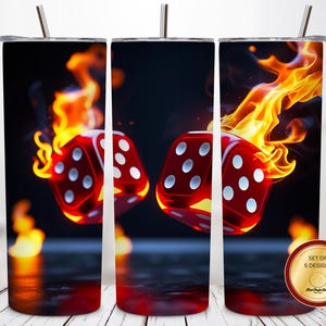 May include: Tumblers with a striking design of red dice on fire against a dark backdrop. The dice show white dots, and the flames are yellow and orange. The tumblers have a silver straw and a set of 5 designs.