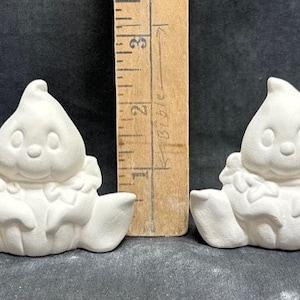 Ready to Paint Ceramic Bisque Clay Magic Baby Ghost in pumpkin