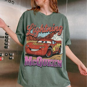 May include: A handmade wooden sign with the text "Welcome to our home" in a handwritten style. The sign is painted white with a dark stained frame. The sign is decorated with a green wreath and a red bow.