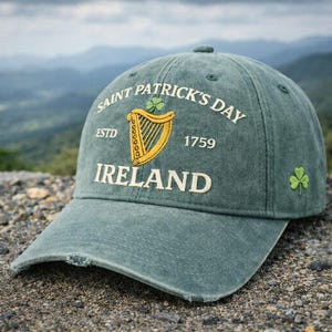 May include: A distressed green baseball cap with the text "Saint Patrick's Day Ireland" and a gold harp emblem. The cap also features a small shamrock and the year 1759. The hat is made of a soft, worn material.