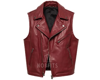 May include: A sleeveless burgundy leather vest with a classic biker jacket design. Features include an asymmetrical zipper closure, multiple zippered pockets, and a notched lapel collar. The vest has a black interior lining and the text "NOBFITS" is visible.