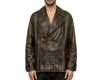 May include: Brown leather double-breasted jacket with a distressed finish. The jacket features a notched collar, multiple buttons, and a classic pea coat design. The sleeves have buttoned cuffs. The jacket has the text "NOBFITS" on the bottom right.