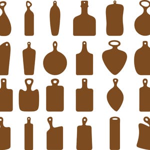 May include: A selection of brown wooden chopping boards in diverse forms. The designs include rectangular, oval, and uniquely shaped boards, each with a handle or hanging hole. The boards are arranged in a grid pattern against a white backdrop.