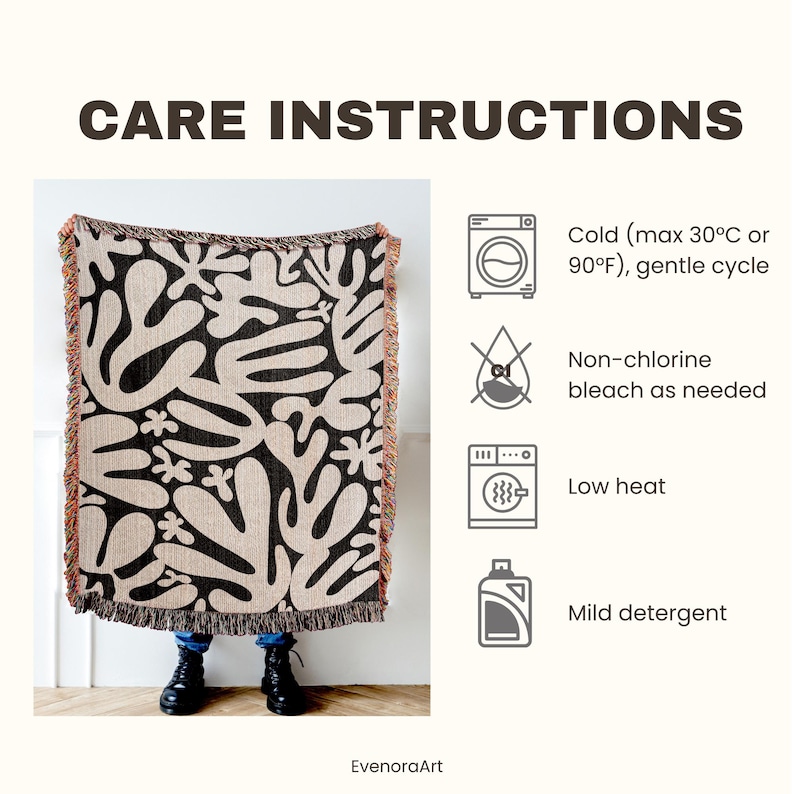May include: A patterned throw blanket with a black and beige abstract design. The blanket has a fringed edge and the words "CARE INSTRUCTIONS" are at the top. Care instructions include cold wash (max 30&deg;C), non-chlorine bleach, low heat, and mild detergent.