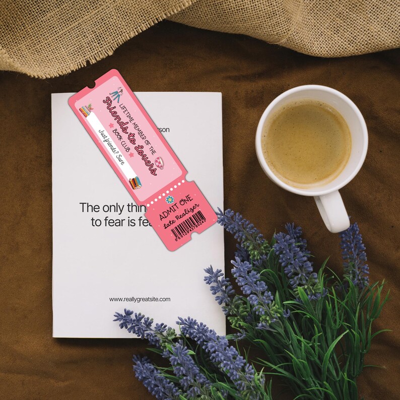 May include: A pink book club ticket with the text "Friends to Lovers Book Club" and "Admit One". The ticket is placed on a white book next to a cup of coffee and a bouquet of lavender.