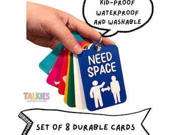 May include: A set of 8 colorful communication cards on a metal ring. The blue card features the white text NEED SPACE and a graphic of two figures with a double-sided arrow between them. A speech bubble reads DURABLE KID-PROOF WATERPROOF AND WASHABLE.