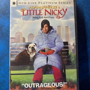 May include: DVD case for the movie "Little Nicky" starring Adam Sandler. The cover features Sandler in a light blue coat, red pants, and a dog. Text includes "OUTRAGEOUS!" and "Being Evil Ain't Easy."