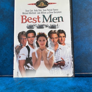 May include: DVD case for the movie "Best Men" featuring Dean Cain, Andy Dick, Sean Patrick Flanery, Mitchell Whitfield, Luke Wilson, and Drew Barrymore. The cover art shows the cast and the title in red letters.