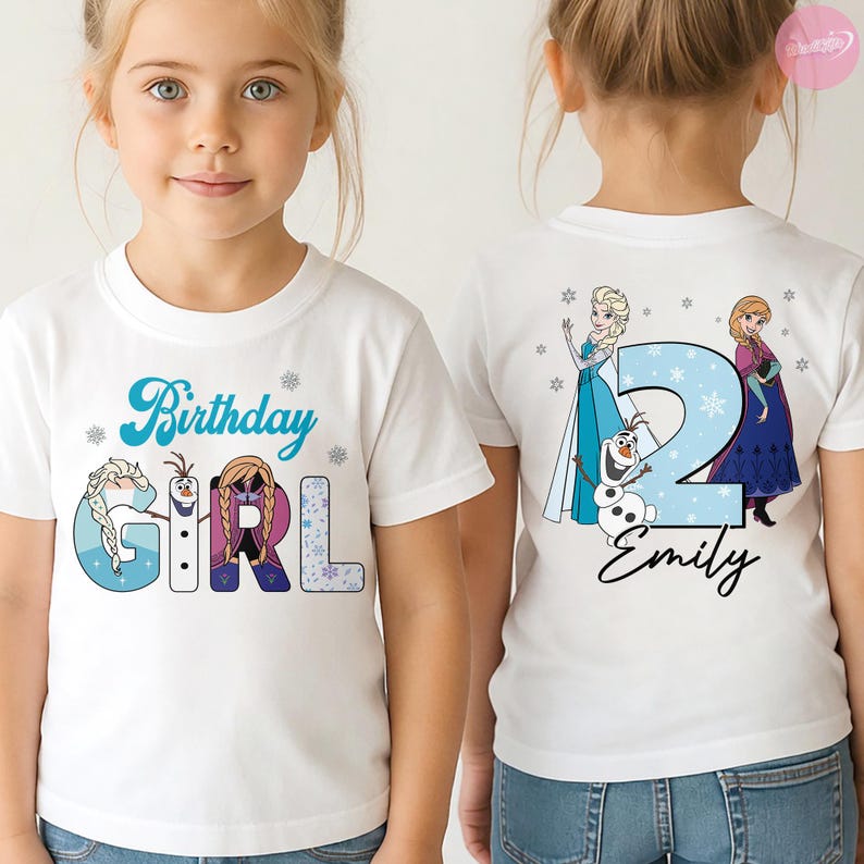 May include: White t-shirt with a blue "Birthday Girl" design featuring cartoon characters and snowflakes. The back of the shirt displays a large blue number "2" with the name "Emily" and more cartoon characters.