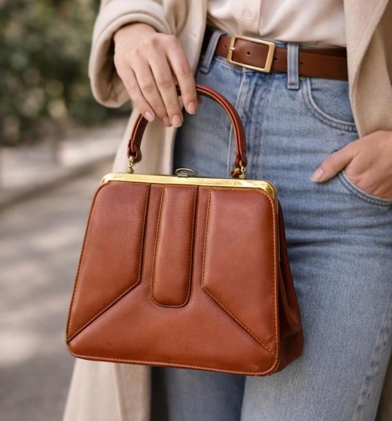 ヴィンテージコニャックレザーのトップハンドルバッグ、構造的な80年代 