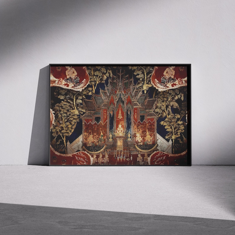 May include: A framed artwork depicting a traditional Thai temple with intricate details and vibrant colours. The temple is surrounded by lush greenery and a blue sky. The artwork is framed in black.