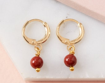 Small gold huggies with red stone pendant | Jasper gemstone hoop earrings | Gold ear huggies with red gemstone | Gold sleeper earrings