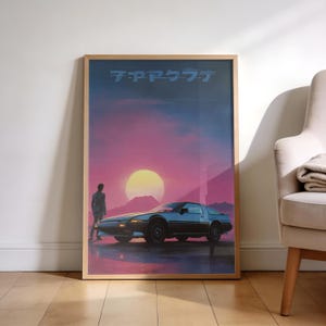 May include: Framed art print featuring a retro-style illustration of a black sports car with a person standing nearby, set against a vibrant sunset with Japanese text at the top. The artwork is in a wooden frame.