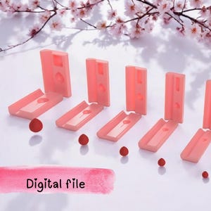May include: A collection of six coral-colored, rectangular objects with a curved design, each with a small, round, red object. The words "Digital file" are written in a pink watercolor style.
