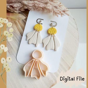 May include: A pair of handmade earrings with a yellow textured circle and cream-colored petal-shaped dangles. A matching clay cutter is below the earrings. The words "Digital File" are in the lower right corner.