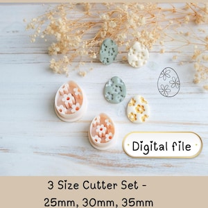 Peut inclure: Un ensemble de découpoirs à biscuits en forme d'œuf sur le thème de Pâques, avec des motifs de fleurs. L'ensemble comprend trois tailles : 25 mm, 30 mm et 35 mm. L'image montre également des œufs décorés et une étiquette de fichier numérique.