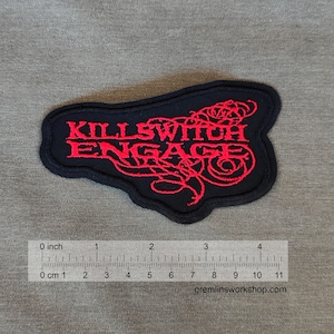 May include: Red embroidered patch with the band name "Killswitch Engage" on a black background. The patch is approximately 3 inches wide.