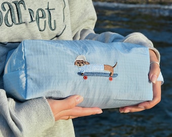 Broderad sminkväska med taxmotiv: Necessär i ripstop-nylon