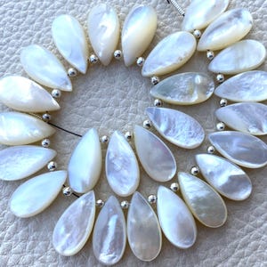 Brand New 4 Matched Pair, Natural White MOTHER OF PEARL Smooth Pear Shape Briolettes, 15x7mm size.Superb Item at Low Price