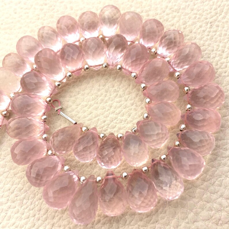 Elongated Micro Faceted Drops Shape Briolettes,12-11mm size.Amazing Item at Low Price. 12 Strand Rare Natural MADAGASCAR Rose Quartz