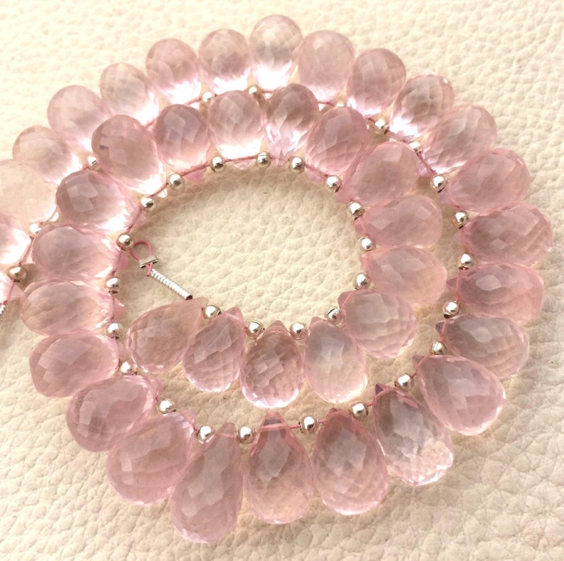 Elongated Micro Faceted Drops Shape Briolettes,12-11mm size.Amazing Item at Low Price. 12 Strand Rare Natural MADAGASCAR Rose Quartz