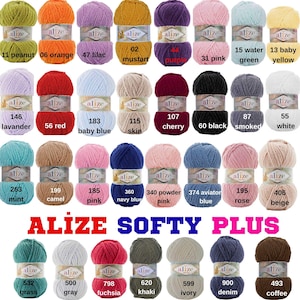 May include: A collection of Alize Softy Plus yarn skeins in various colors, including orange, purple, pink, and blue. Each skein is labeled with a color name and number. The Alize Softy Plus logo is prominently displayed.