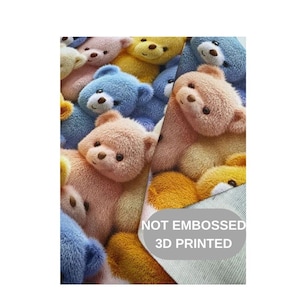 May include: A close-up of a collection of plush teddy bears in various colors, including pink, yellow, and blue. The bears have soft, textured fur and dark eyes. The text "NOT EMBOSSED 3D PRINTED" is visible.