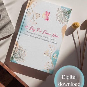 May include: A book titled "A Day To Draw Near" with floral and butterfly illustrations. The cover features the text "The Ultimate Guide to Successful God-Centered Fasting for Busy Christians." The image also includes the text "E-book PDF" and "Digital download."
