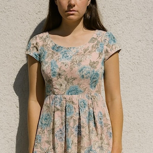 Vintage pink floral mini dress with pleated skirt short sleeves soft cotton blend romantic feminine retro zipper back