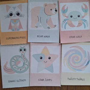 May include: Six colorful cards with illustrations of a cat, bear, crab, snake, star, and a swirl. Each card has a title: Superhero Pose, Bear Walk, Crab Walk, Snake Slither, Star Jumps, and Twisty Twirls.