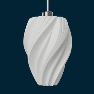 May include: A white, modern pendant light fixture with a swirling, textured design. The light hangs from a silver-colored metal fixture against a dark blue background. The shade has a unique, sculptural shape.