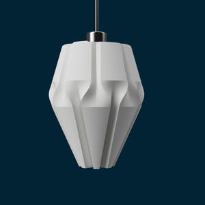 May include: A white, geometric pendant light fixture with a faceted design. The light hangs from a silver-colored cord and a circular canopy. The lamp has a modern, minimalist aesthetic against a dark blue background.