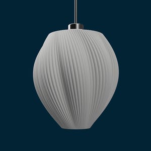 May include: A white, textured pendant light fixture with a ribbed design. The light hangs from a silver-colored cord and a small, circular fixture. The light has a rounded, bulbous shape.