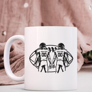football players svg
football name svg
football season svg
two football players
american football
gameday svg
customized football
football decals
football team png
football players png
football shirt svg
football players dxf
cricut files