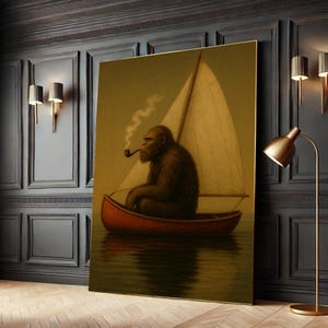Puede incluir: Impresión en lienzo enmarcada que representa a un Sasquatch fumando una pipa en un pequeño velero. La obra presenta un bote rojo, una vela blanca y agua en calma. El Sasquatch es marrón y peludo, con una expresión contemplativa.