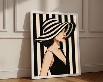 May include: Framed art print featuring a woman in a black dress and a wide-brimmed hat with black and white stripes. The artwork has a pop art style, with a black and cream striped background.
