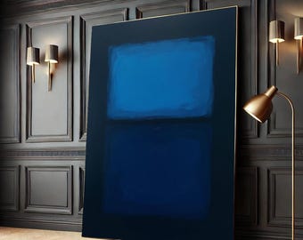 May include: Abstract painting with two horizontal bands of blue paint. The top band is a lighter shade of blue than the bottom band. The painting is framed in a thin gold frame.