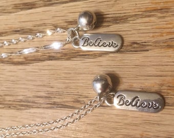 Silver BELIEVE pendant necklace with tinkling bell