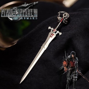 May include: A silver sword keychain with a red and white design. The keychain features the text "FINAL FANTASY VII REMAKE".
