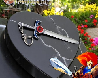 Porte-clés épée Thundercats - Modèle d'arme anime, porte-clés élégant pour homme, accessoires de voiture et souvenirs parfaits pour les fans