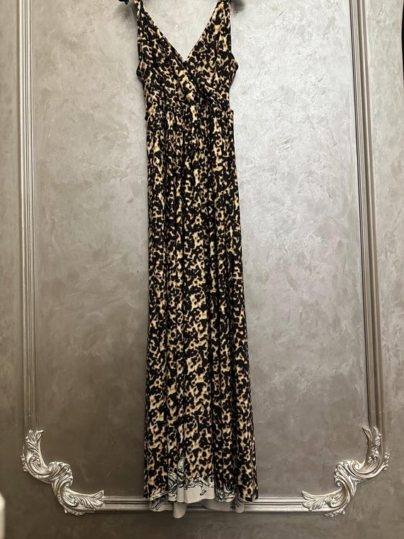 roberto cavalli vintage dress Rent this Corset + more at ISLEOFMONDAY.COM. Join the list for early access, viewing inventory and renting what you love before we launch Roberto Cavalli Vintage Maxi Dress