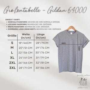 May include: Size chart for Gildan 64000 unisex t-shirts. The chart shows the width and length measurements in inches and centimetres for sizes S, M, L, XL, 2XL, and 3XL. The chart also includes instructions for choosing the correct size based on desired fit.
