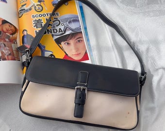 Bolso de hombro vintage Coach Hampton con solapa - Auténtico cuero y lona color crema y negro estilo Y2K - Modelo 7702