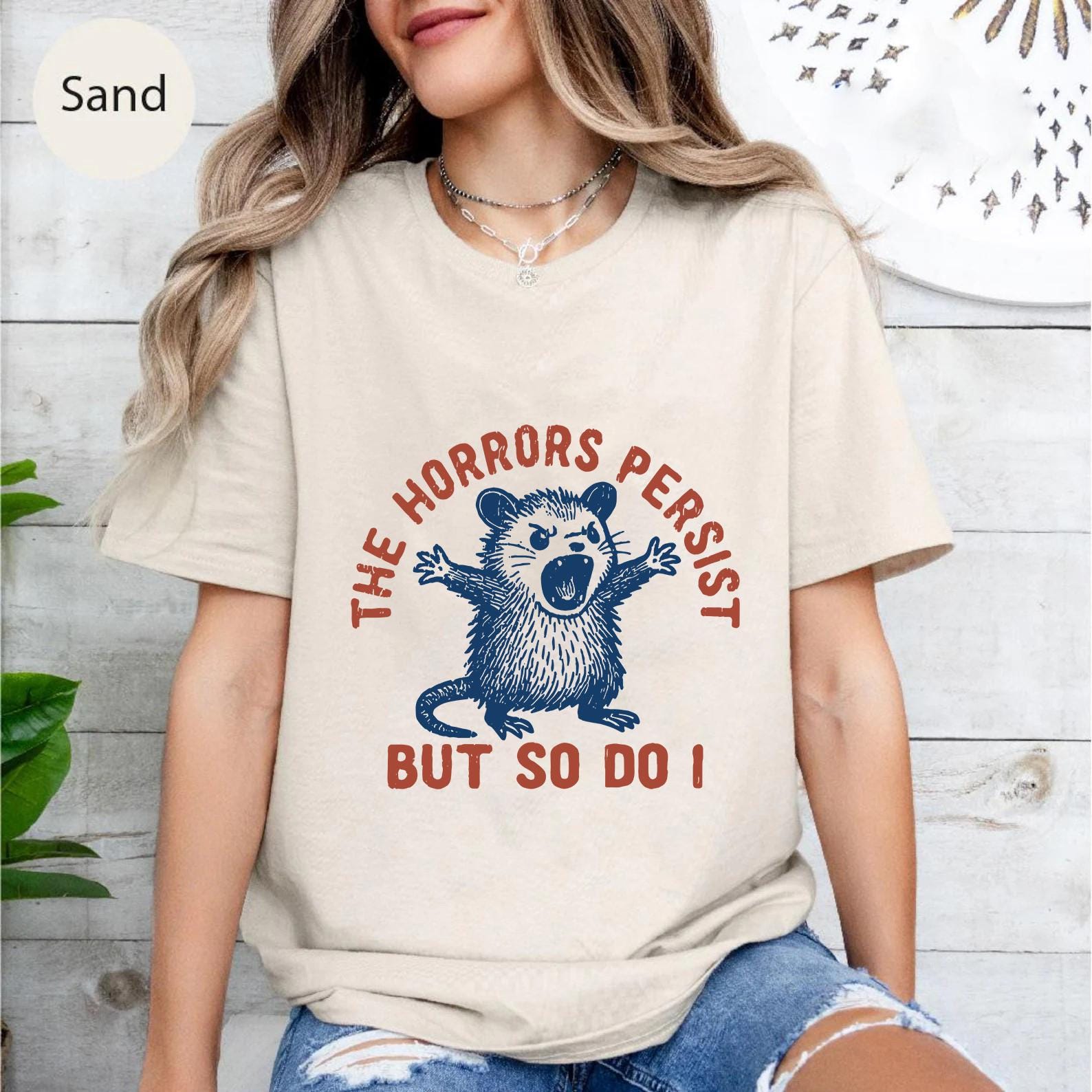 The Horrors Persist But So Do I Shirt - Funny Angry Possum Tee - Mental Health Humor T-Shirt - Resilience Meme Shirt