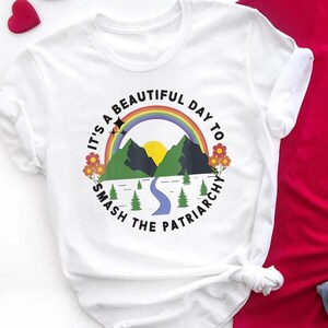 It’s a Beautiful Day to Smash the Patriarchy Shirt – Feminist Rainbow Graphic Tee – Cute Empowerment Shirt for Women & Activists