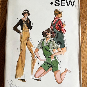 May include: A Kwik Sew pattern envelope, number 708, for sizes 5, 7, 9, and 11. The cover features illustrations of overalls in long and short styles, worn with various shirts. Text includes Kwik Sew Pattern Co., Inc., Minneapolis, MN, and designer Kerstin Martensson.