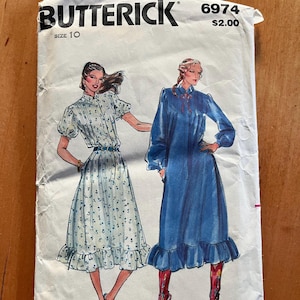 new vintage Butterick sewing pattern 6974 long loose dress, puffed sleeves front button placket collar and ruffle skirt size 10