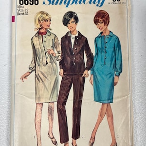 May include: A Simplicity 6696 sewing pattern envelope for Miss Size 12, Bust 32. The illustration shows three outfits: a light beige dress, a dark brown pantsuit, and a blue dress, all featuring button-front closures and long sleeves.