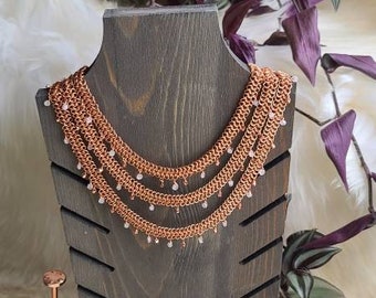 Layers of copper with moonstone and brass beads